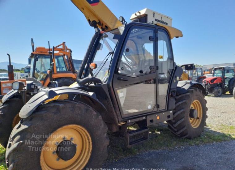 télescopique jaune Caterpillar TH407 de 2019